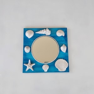 Handmade nautical sea shell wall mirror in white and turquoise, coastal beach house decor, seashell wall art