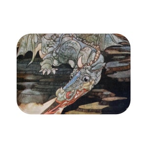May include: A blue and gray dragon with red eyes and a long, pointed snout is breathing fire. The dragon is lying on a rocky surface with a dark background.