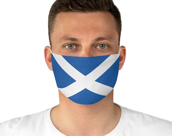 May include: A blue face mask with a white diagonal cross, representing the flag of Scotland.