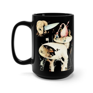 May include: Black ceramic mug with a white handle. The mug features a colorful surrealist painting of a landscape with multiple levels and figures. The painting is reminiscent of the work of Hieronymus Bosch.