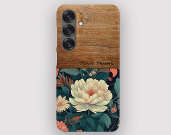 May include: A phone case with a wood grain top and a floral design on the bottom. The floral design features a large white flower with a pink center, surrounded by green leaves and smaller flowers. The text "Your Name" is printed on the wood grain.