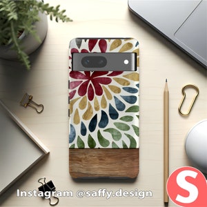 a phone case with a flower design on it