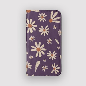 Funda tipo cartera con diseño floral de margaritas moradas / Funda tipo libro con tarjetero / Compatible con iPhone 16, 15, 14, 13 y Samsung Galaxy S25, S24, S23 y S22