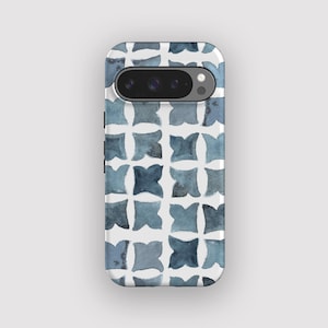 May include: A smartphone case featuring a repeating pattern of blue watercolor-style four-pointed shapes on a white background. The case has a horizontal camera cutout at the top with visible lenses and a flash, maintaining a clean, flat design.