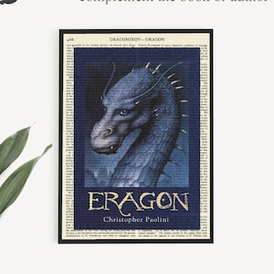 May include: A printable book art image featuring a blue dragon with the text "DRAGOMIROV - DRAGON" and "ERAGON" with the author's name "Christopher Paolini" underneath.