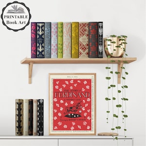 Peut inclure: Art d'impression de livre avec une illustration rouge et blanche d'un taureau du livre pour enfants "L'histoire de Ferdinand" de Munro Leaf. L'illustration est entour&eacute;e d'un fond rouge avec des fleurs blanches et du texte.
