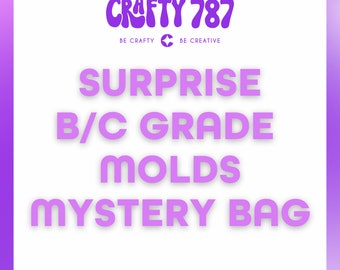 May include: Purple text on a white background reads "CRAFTY 787 BE CRAFTY BE CREATIVE SURPRISE B/C GRADE MOLDS MYSTERY BAG".