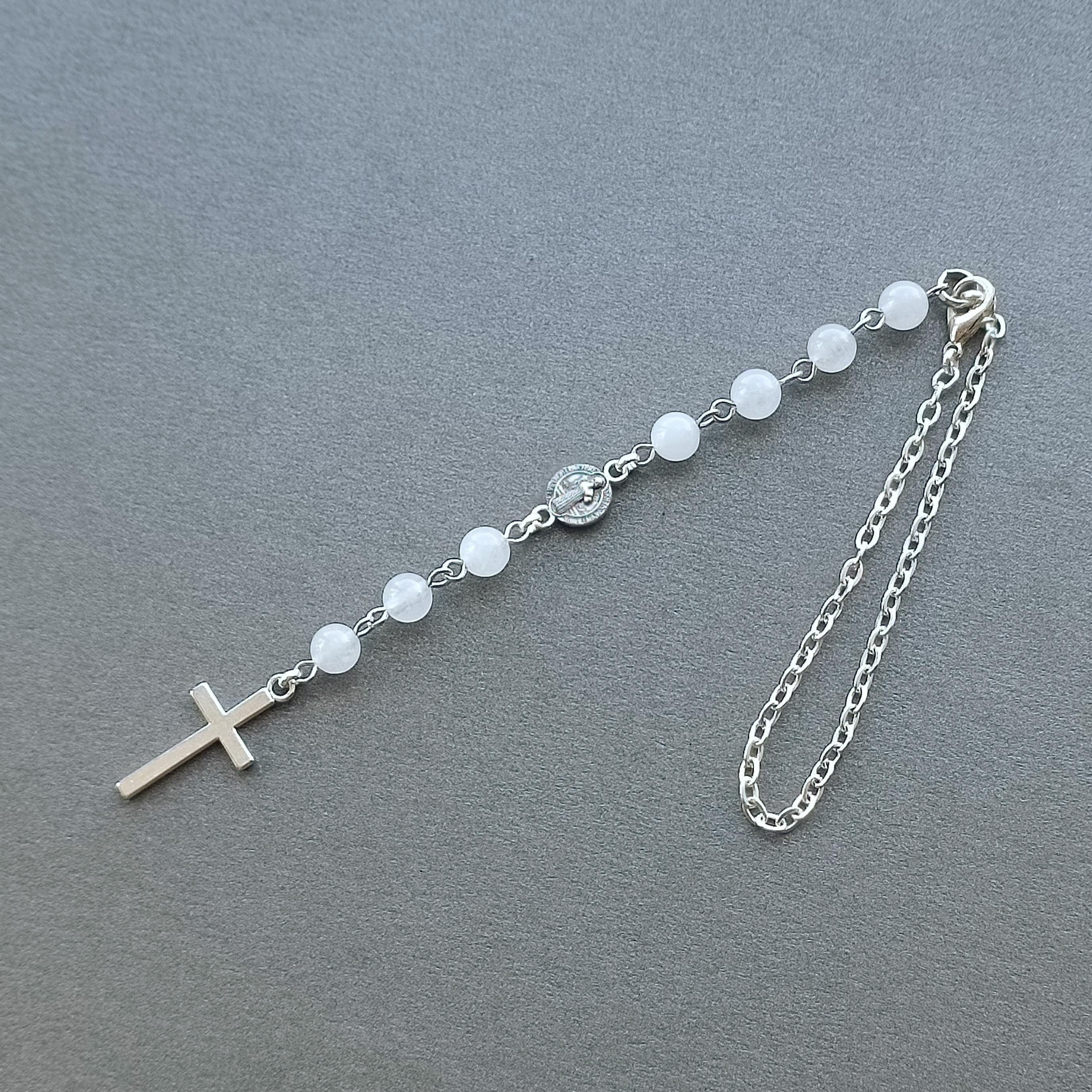 car accessory from white quartz with cross for car mirror, amulet for luck, protection the car and its owner, car rear view mirror