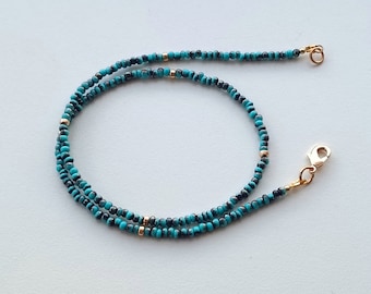 small seed bead necklace with gold plated details