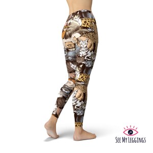 May include: Brown leggings with a colorful print of cats. The leggings are full-length and have a tight fit. The print features a variety of cat breeds, including tabby, calico, and Siamese.