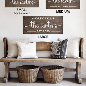 May include: Wooden family name signs in three sizes: small, medium, and large. The signs are brown with white text that reads "the carters" and "EST. 2025". The large sign also includes the names "Andrew & Ellie".