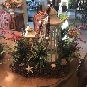 Handmade Custom Lantern Nautical Centerpieces with silk flowers, seashells, starfish, and fishnet image 2