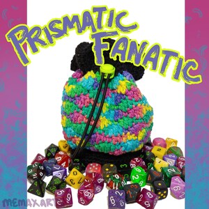 May include: A crocheted dice bag with a drawstring closure. The bag is multi-colored with pink, blue, green, and yellow. The bag is filled with colorful dice.