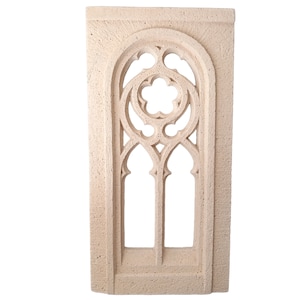 May include: A beige stone wall decor with a carved arched window design. The window has a detailed pattern of circles and arches.