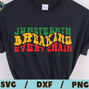 May include: A black t-shirt with a green, yellow, and red graphic that says "Juneteenth Breaking Every Chain" in a retro font.