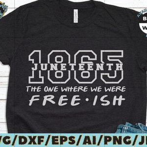May include: A black t-shirt with a white graphic design that says "1965 Juneteenth The One Where We Were Free-ish".