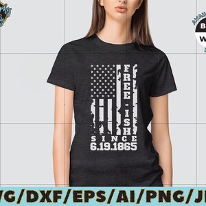 May include: A black t-shirt with a white distressed American flag design. The flag has the text "FREE-ISH SINCE 6.19.1865" on it.