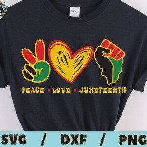 May include: Black t-shirt with a peace sign, heart, and fist graphic. The text "Peace Love Juneteenth" is printed below the graphic.