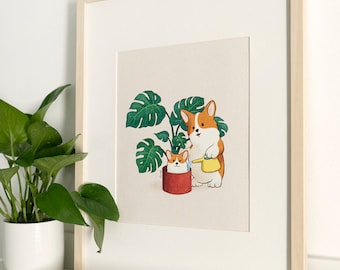 May include: A framed illustration of two corgi dogs, one watering a potted monstera plant with a yellow watering can. The larger corgi is standing behind the smaller corgi, which is sitting in the pot.