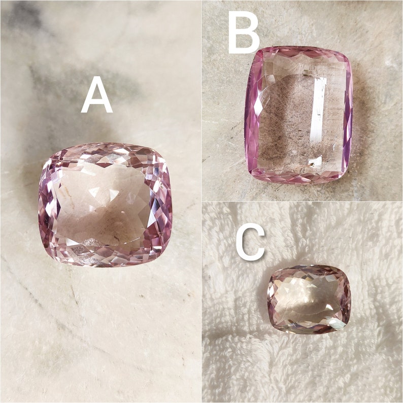 May include: Three pink cushion-cut gemstones labeled A, B, and C. The gemstones are faceted and have a translucent appearance.