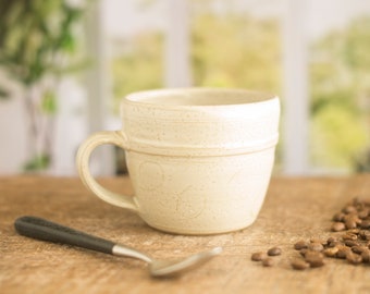 Handmade pottery half pint mugs,  rustic pottery mug with a tactile off white glaze