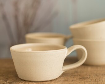Handmade small pottery mug, a wide low mug in a white speckle satin glaze, coffee mug,