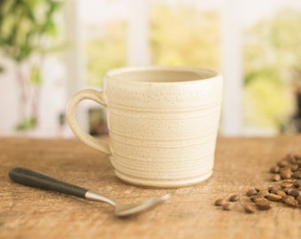 Handmade pottery half pint mugs,  rustic pottery mug with a tactile off white glaze