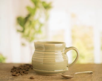 Handmade pottery mug, in a green / grey celadon glaze, coffee mug,