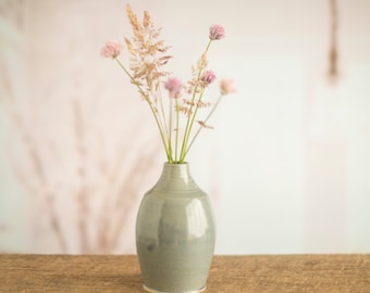 Small pottery bottle vase