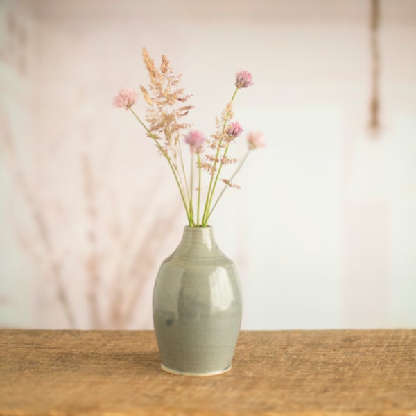 Small pottery bottle vase