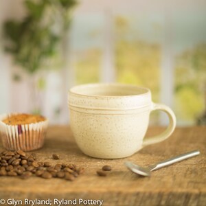 Handmade small pottery mug, a wide low mug in an off white satin glaze, coffee mug, image 4