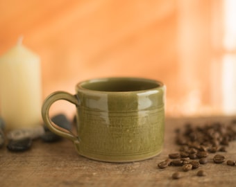Handmade pottery mug, in a green / grey celadon glaze, coffee mug,