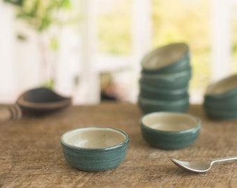 Small serving bowls, small bowls for individual sauce, dips.  Mini bowls