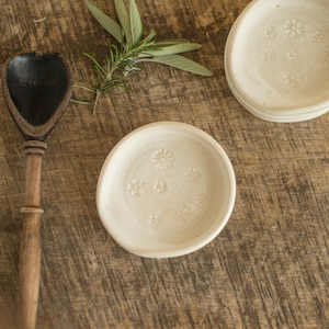 Spoon rest handmade pottery, with flower decoration.