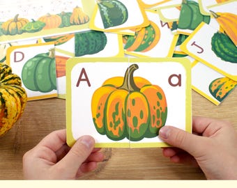 Rompecabezas del alfabeto de calabazas: tarjetas para emparejar y hoja de trabajo para trazar letras. Actividad del abecedario otoñal. Rompecabezas para niños pequeños y preescolares.