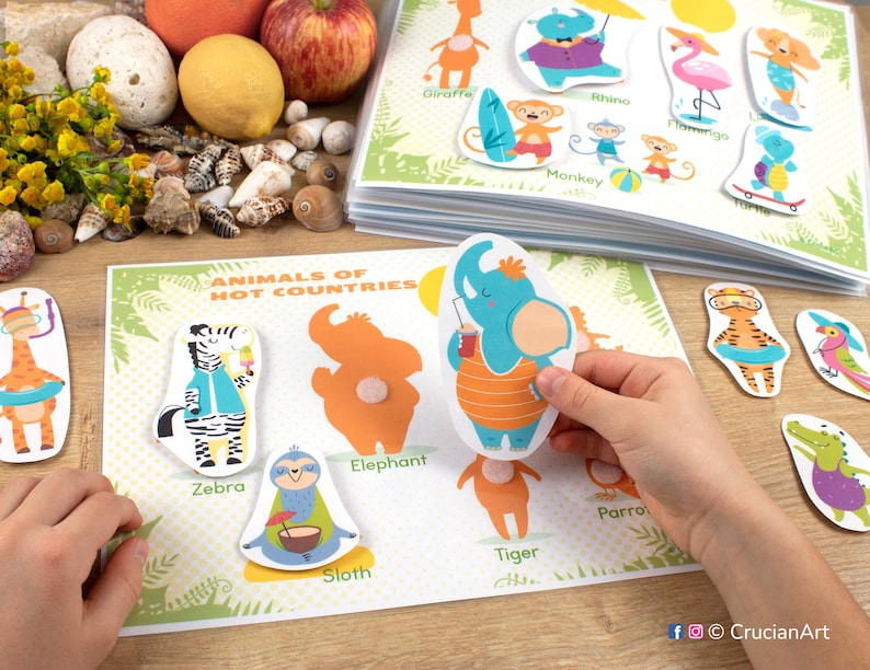 May include: A colorful educational game for kids featuring animals from hot countries. The game includes a board with images of a giraffe, rhino, flamingo, elephant, zebra, monkey, parrot, sloth, and tiger. Each animal has a corresponding cutout piece that can be matched to the correct image on the board.