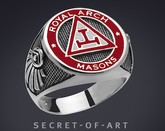 May include: A silver ring with a red and white enamel design. The ring features a triangle with the letter "L" inside and the words "Royal Arch Masons" around the outside.