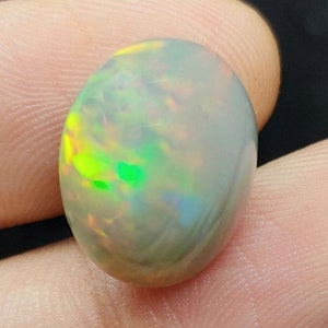 Natural 7.83 Carat Large Grey Ethiopian Welo Opal, Oval Cabochon with Bright Fire, Loose Gemstone for Custom Jewelry & October Birthstone