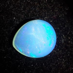 Large Ethiopian Welo White Opal – 8.18 Carat Pear Cabochon with Bright Fire , Unique Gemstone for Wedding Jewelry , Luxury Birthstone Gift