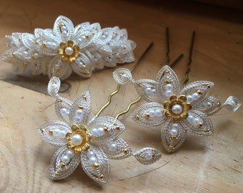 Large cordonet flower with small gold beads