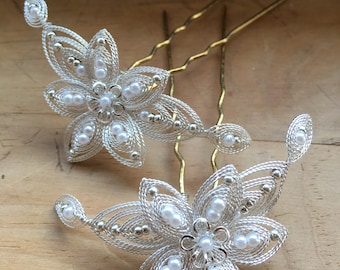 Large cordonet flower with small silver beads