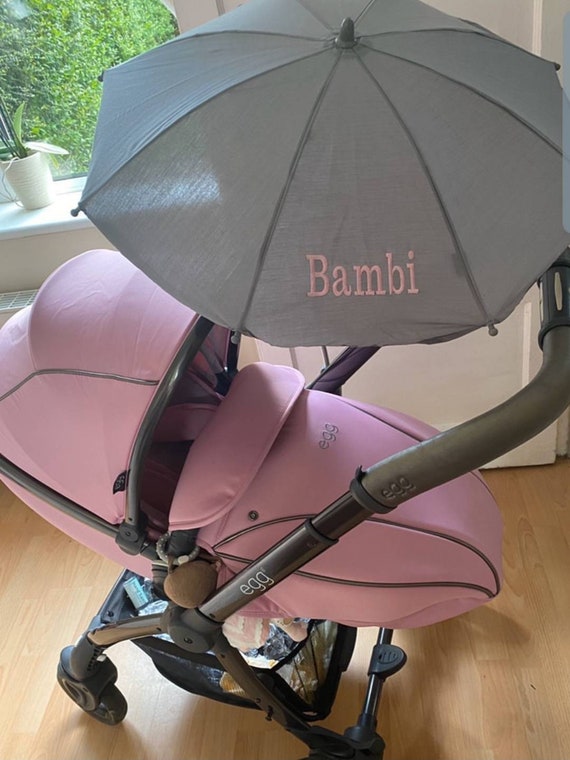 pink parasol for buggy