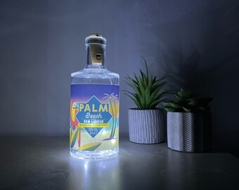 Up-cycles palm beach banana and butterscotch rum liquor into a bedside night light mood lighting