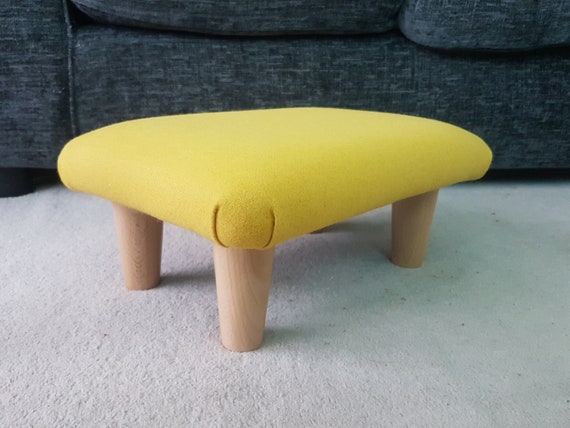 Small cheap yellow footstool