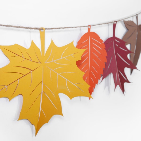 Autumn Leaves Garland paper leaf bunting in autumnal colours. Eco friendly Thanksgiving, wedding backdrop, fall home decor photography prop