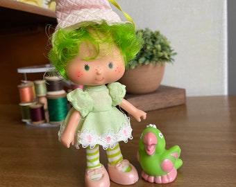 Gasa de lima con loro parfait - Sombrero adjunto - Vintage Strawberry Shortcake Friend - Kenner 1980s