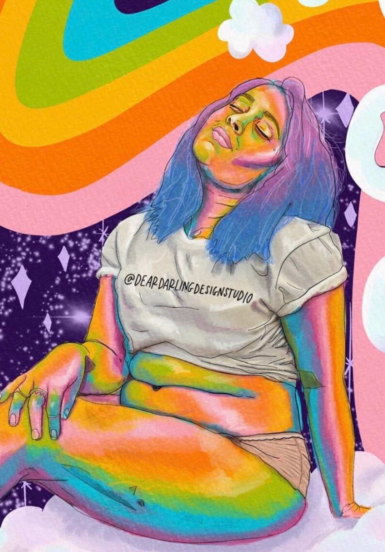 May include: Illustration of a person with blue hair and rainbow-colored skin, wearing a white t-shirt with the text "@DEARDARLINGDESIGNSTUDIO". The background features a rainbow, clouds, and a starry sky. The artwork has a whimsical and colorful aesthetic.