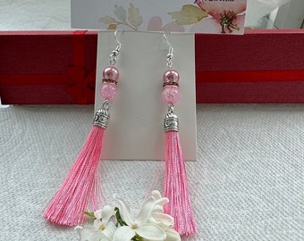 Blushing Beauty Tassel Earrings: Delicate Pink Hue with Pearl Crystals for a Touch of Elegance and Femininity. Perfect for Valentine's Day.