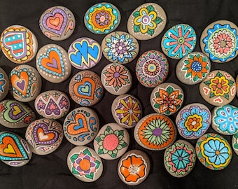 assortment of painted rocks, kindness rocks, hand painted flower themed rocks, wedding favor painted rocks, party favor rocks,Table favors