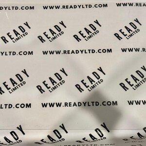 May include: A white background with the text "READY LIMITED" repeated multiple times. The text is in black and is arranged in a diagonal pattern. The website address "www.readyltd.com" is also repeated multiple times.